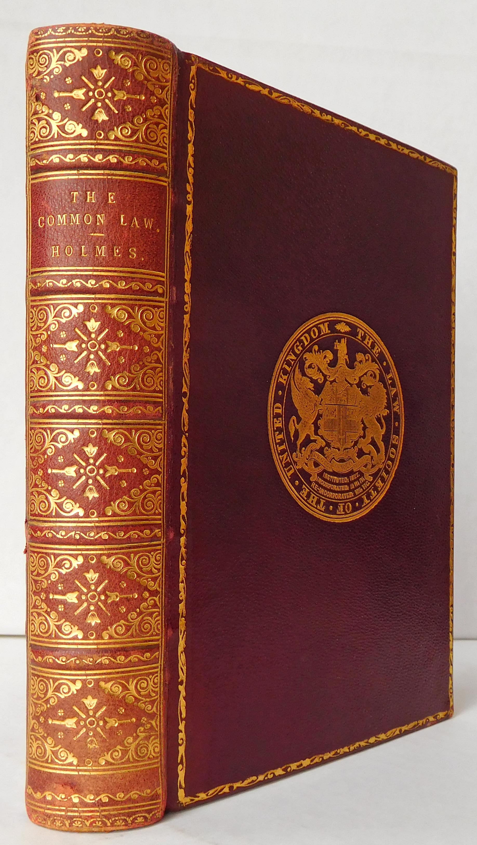 Holmes, Oliver Wendell - The Common Law [a prize binding presented by The Honorable Society of Clements Inn to Arthur Wansbrough Jones, who placed first in first class at the examination held in January, 1889; with the seal of the Inn, in gilt, on the front board]